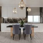 A modern dining area with gray chairs, a sleek table, and vinyl wood-look flooring.
